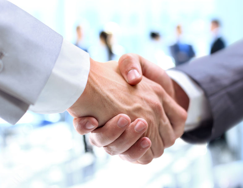 22501924 - closeup of a business handshake